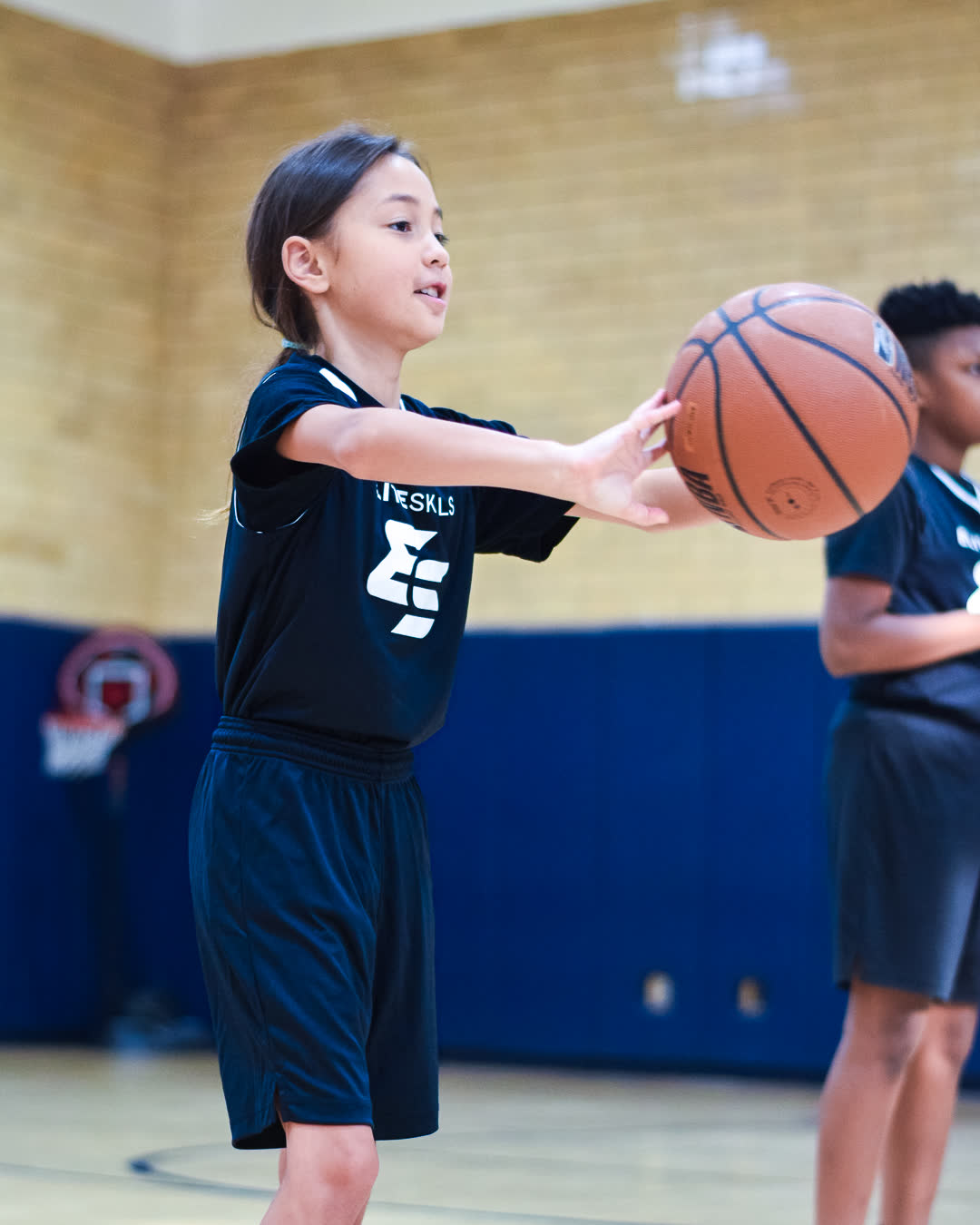 Camper passing at summer camp